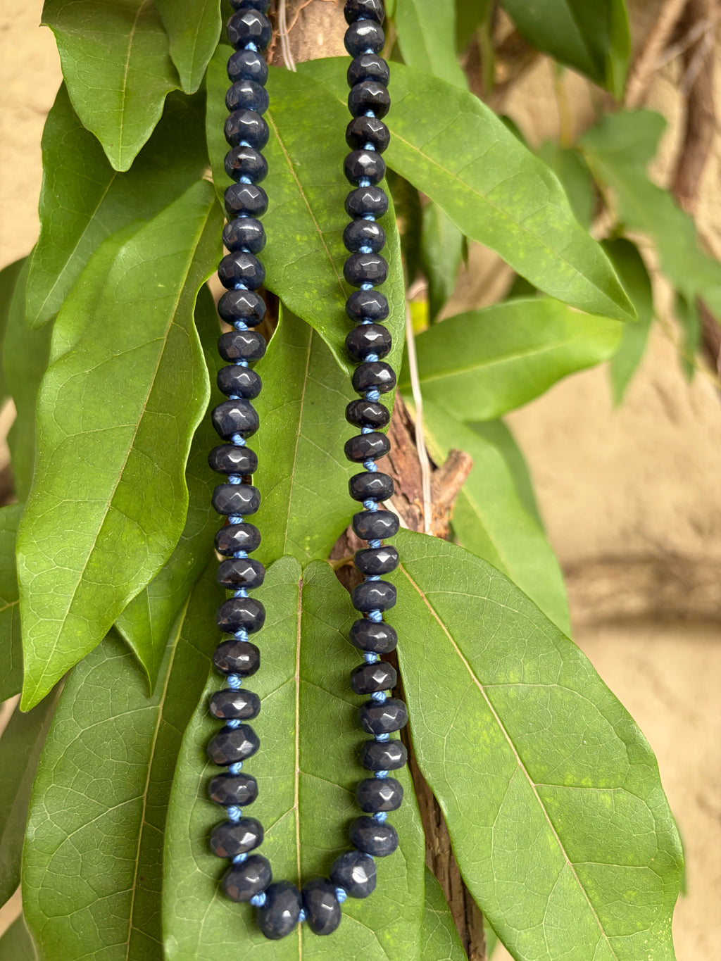 Dark Blue Faceted Beads Hand Knotted on Silk Cord