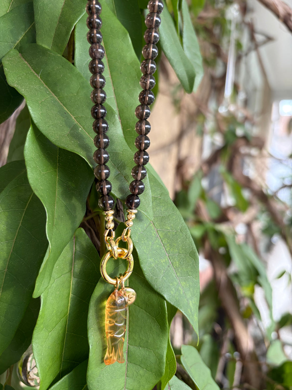 Smoky Quartz Beaded Necklace with Carved Fish Charm